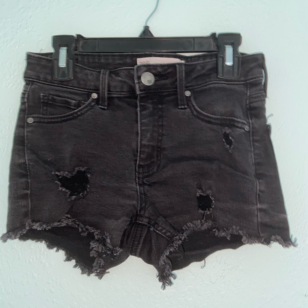 Black ripped shorts